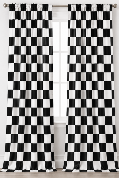 Black and white checkered curtain panels hanging from a silver rod over a window.