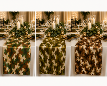 Three vertical panels show a camouflage table runner draped across a dining table set with white linens, glassware, candles, and greenery in a warmly lit indoor event setting.