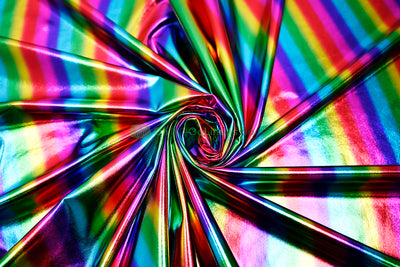 Rainbow Metallic Foil Spandex Lame | Rainbow Stretch Metallic Lame | All Over Multi Color Foil on Stretch Burgundy Knit | 60" Wide