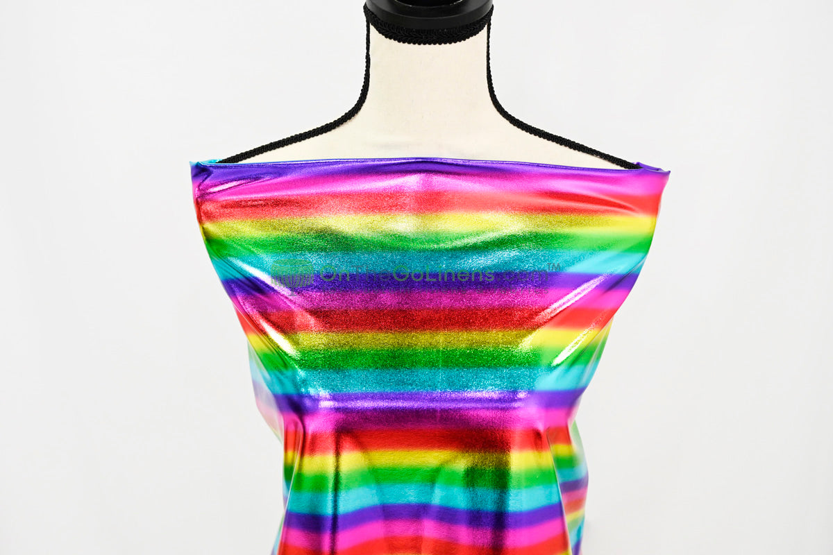 Rainbow Metallic Foil Spandex Lame | Rainbow Stretch Metallic Lame | All Over Multi Color Foil on Stretch Burgundy Knit | 60" Wide