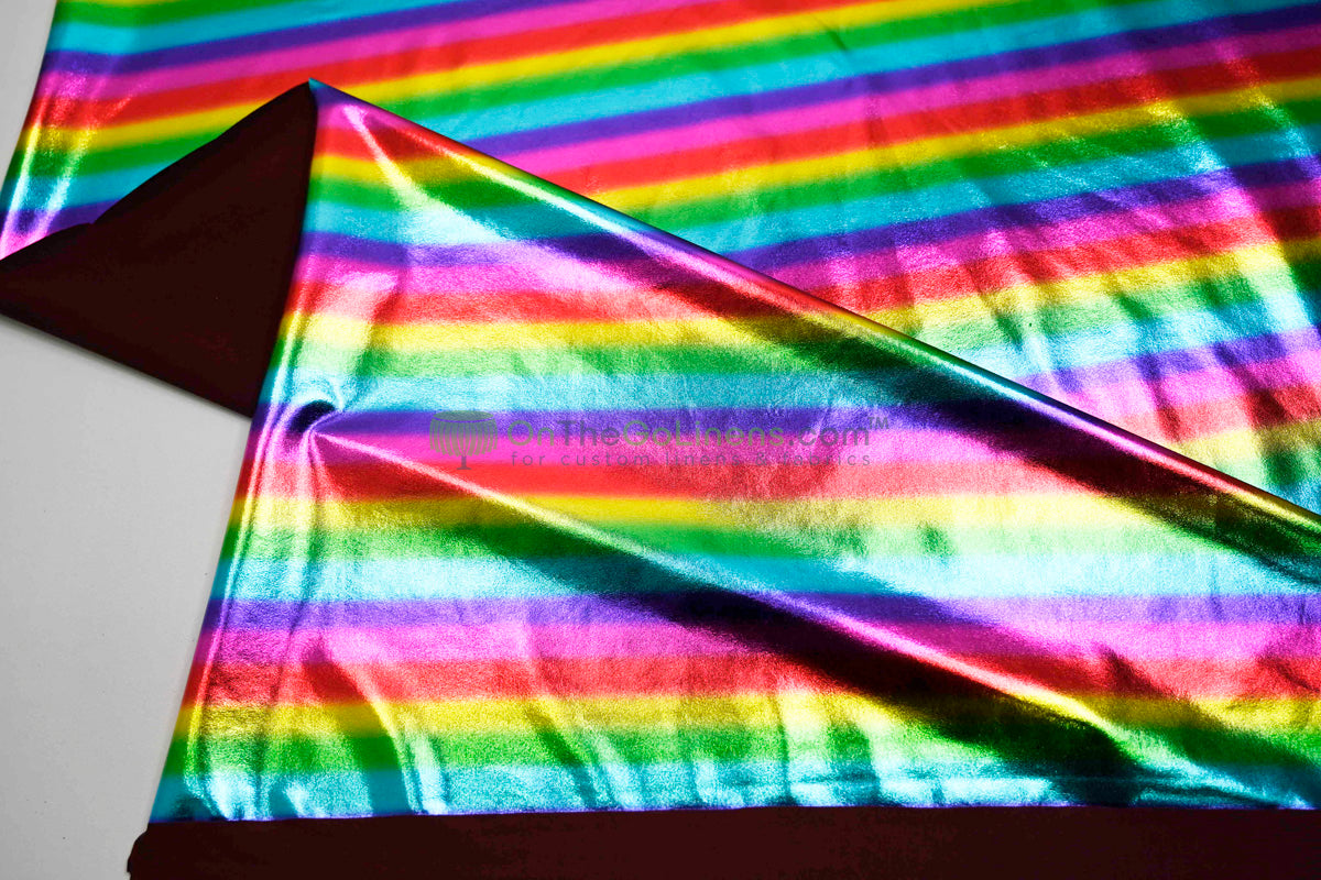 Rainbow Metallic Foil Spandex Lame | Rainbow Stretch Metallic Lame | All Over Multi Color Foil on Stretch Burgundy Knit | 60" Wide