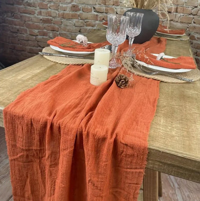 Blaze orange striped store pinwheel table runner